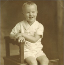 LOUIS AS A HAPPY FIVE-YEAR-OLD.