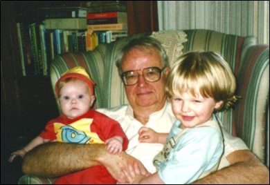 LOUIS LYELL IN HIS LIBRARY WITH HIS GRANDCHILDREN